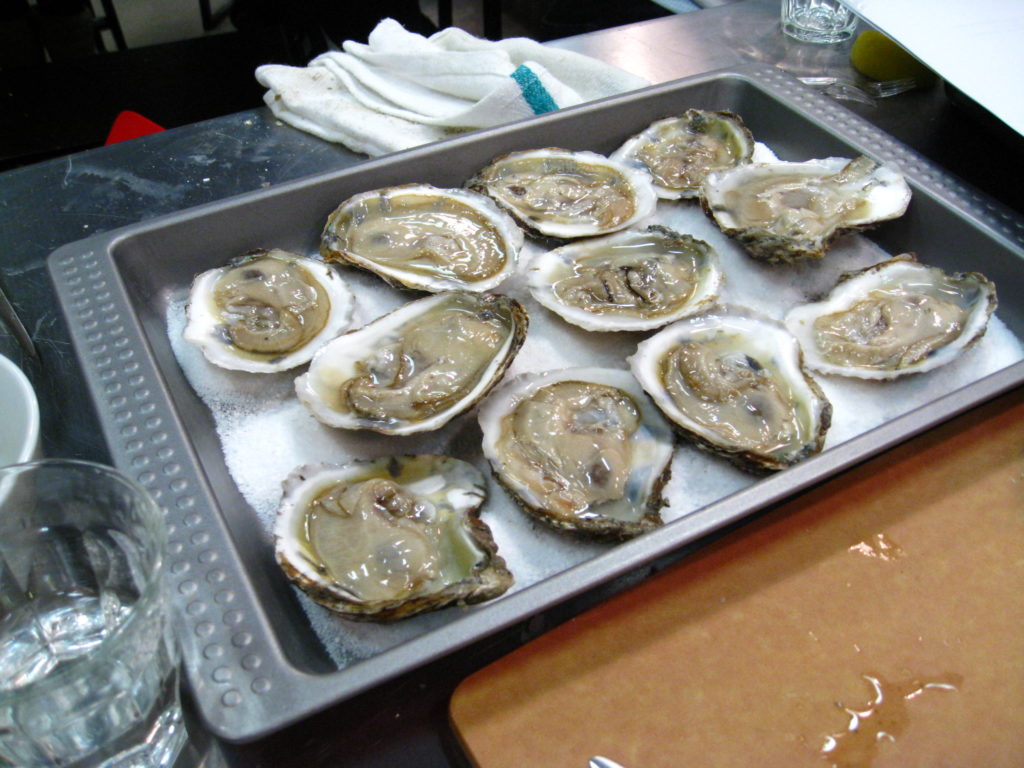 Shucked oysters, ready for some Rockefeller topping